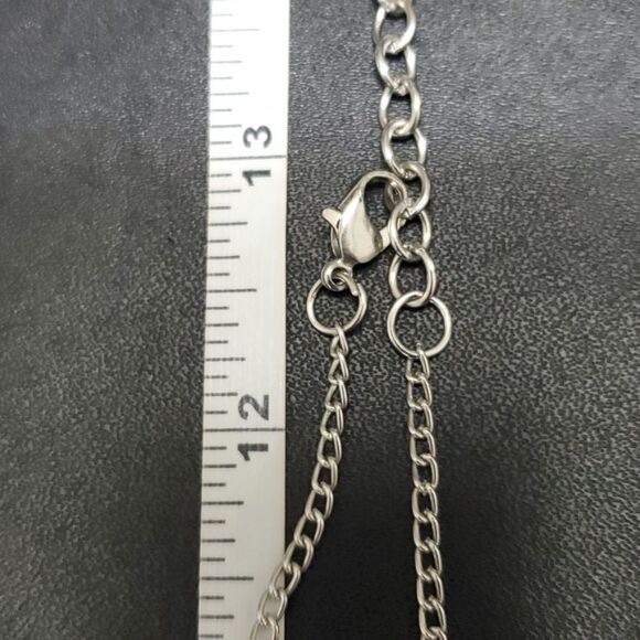 Silver tone elephant and tassel necklace - Picture 7 of 10